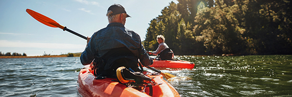 Two elderly people kayaking